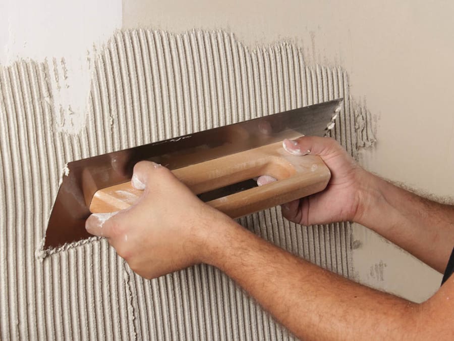 Rubi Tiling Tools Rubi 75962 19in Notched Steel Trowel with Wooden Handle